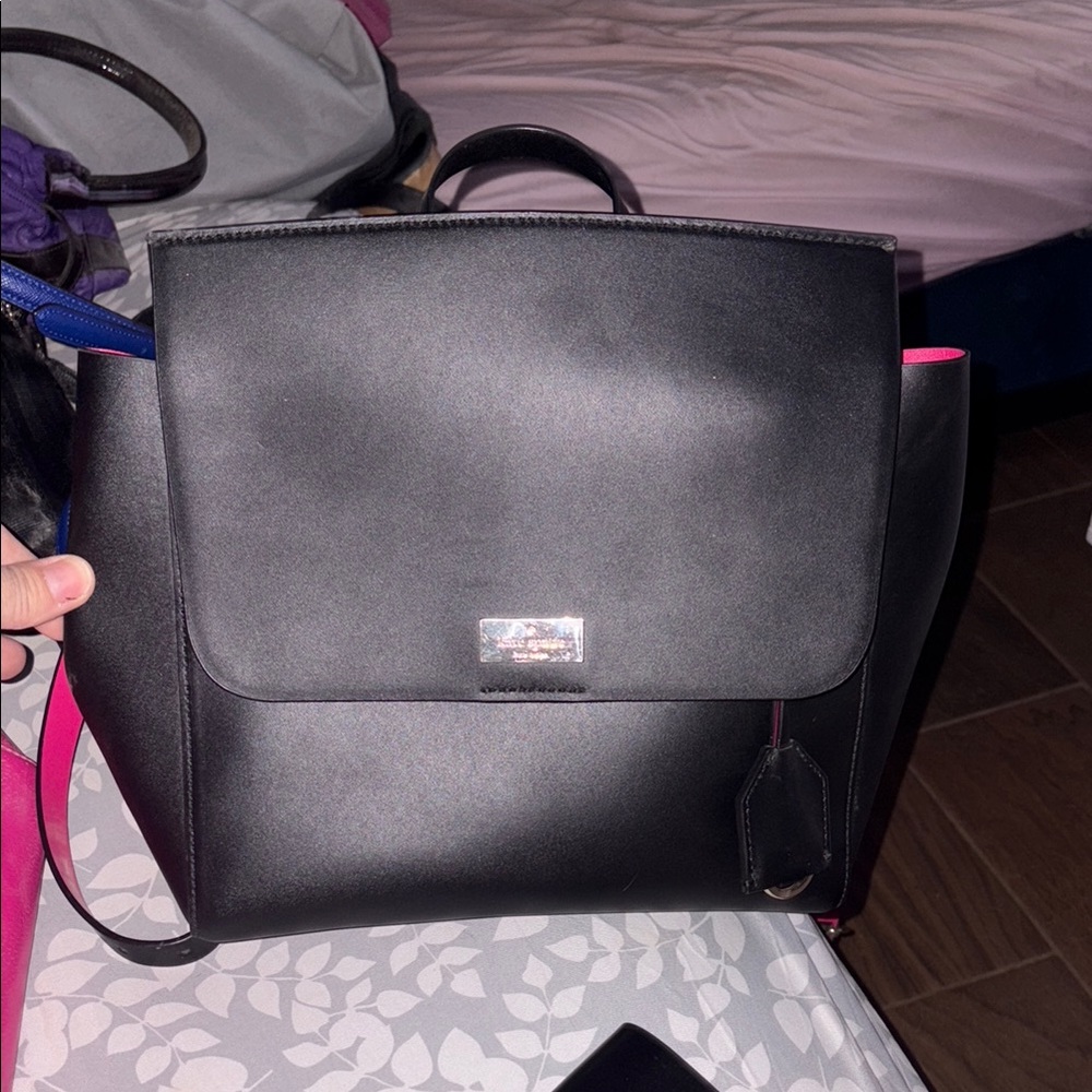 Kate Spade Black Leather Crossbody Bag with matching wallet.